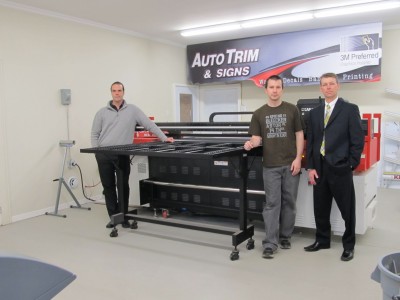 Pictured left to right are: Michael Stock of ND Graphics; Dwayne MacKinnon of Auto Trim and Signs; and Richard Juneau, account executive for Agfa Graphics.