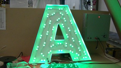 Not all colours are equally bright. Green letters, for example, may need more LEDs installed to achieve the desired effect.