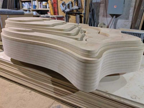 The statues comprised 16 layers of MDF, which were cut one by one using a computer numerical control (CNC) router and stacked onto each other back to front.