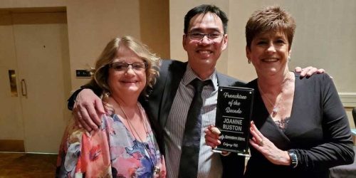 Left to right: Jeannette Marks, office manager, Joe Yee, production manager, and Joanne Ruston, owner of Speedpro Signs North Calgary celebrate being awarded Speedpro Franchise of the Decade at the 2020 SpeedPro National Conference.