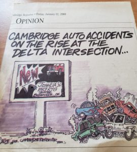 This cartoon from the Cambridge Reporter illustrates how some of the press/public viewed new outdoor digital boards and their potential to cause accidents. In this case, the location being shown is at Hwy. 8 and Hwy.24 (known as the “Delta”) in Cambridge, Ont. VENDO Media is the owner of this location. Photo courtesy VENDO Media