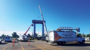 Signs can be installed using bucket trucks, cranes, or a combination of both, depending on the complexity of the project. Photos courtesy John Labonte Signs