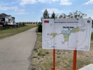 The city of Calgary has installed six temporary wayfinding signs in New Brighton Central Park, to help promote active and safe routes to school for the community. Photo courtesy City of Calgary