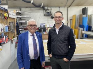 Greg Turner, minister responsible for Opportunities NB, and Nick Hansen, president and CEO of Hansen Signs.