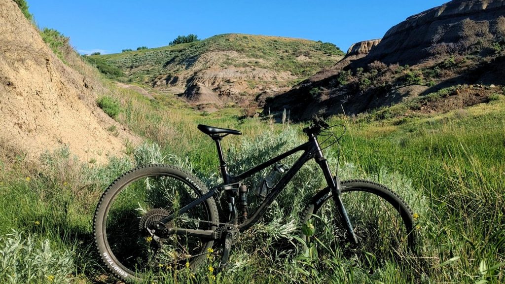 A bike with the mountains behind it. 