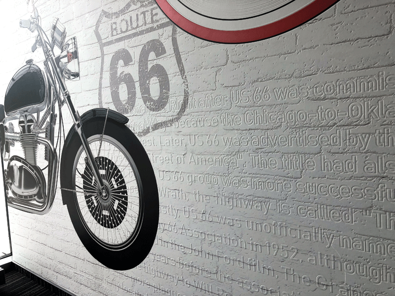 A wall graphic featuring a motorcycle. 