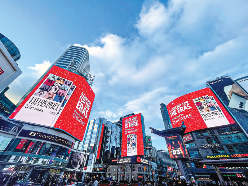 Ads displaying the Eras Tour at Sankofa Square in Toronto. 